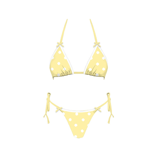 Yellow polka dot bikini set on a white background