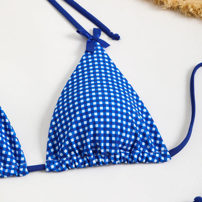 Blue and white gingham bikini top on a white background