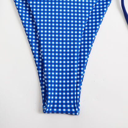 Blue and white gingham swimsuit bottom on a white background