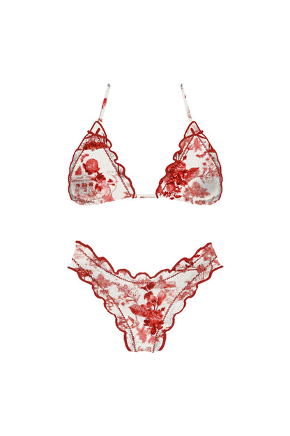 Red and white floral bikini set on a white background